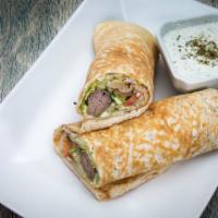 Moby's Kubideh Kabob Sandwich · Ground beef, grated onion with house seasoning. Wrapped in a house pita bread with lettuce, ...