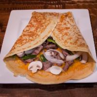The Garden Crepe · Mozzarella cheese, fresh baby spinach, tomato, artichoke, grilled onions, bell peppers, mush...