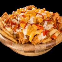 Loaded Fries · Fries topped w/chicken tenders, mac n cheese, ranch, & hot sauce
