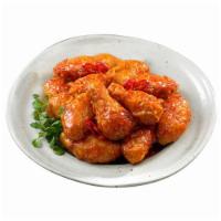 R Wings of Fire · BB wings brushed with our Hot Spicy sauce.