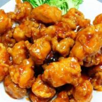 SH7. General Tso's Chicken · Crispy chicken with broccoli in chef's special hot sauce. Served with white rice. Hot and sp...