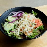 Thai Chicken Salad · Grilled chicken, spring mix, carrot, onion, tomato, sesame seed and mozzarella with Asian se...