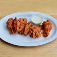 Wings · Includes 4 oz. dressing.