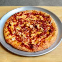 BBQ Chicken Pizza · Chicken, bacon, mixed onions, mixed cheese and topped off with BBQ sauce.