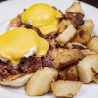 Corned Beef Hash Eggs Benedict · Muffin, egg, ham, and hollandaise sauce.