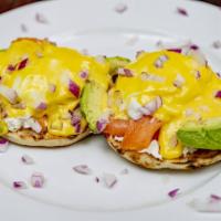 Sushi Roll Eggs Benedict · Served with smoked salmon, avocado, cream cheese and a sprinkle of red onion.
