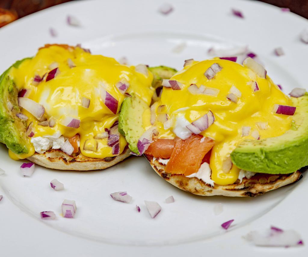 Sushi Roll Eggs Benedict · Served with smoked salmon, avocado, cream cheese and a sprinkle of red onion.