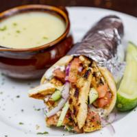 Chicken Souvlaki Gyro Wrap · Tender pieces of marinated chicken served in grilled gyro bread with red onions, cucumbers, ...