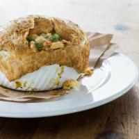 Chicken Pot Pie · Freshly baked with roasted chicken, peas, carrots, onions and potatoes folded into a creamy ...
