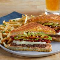 The French Quarter Burger · 100% USDA premium beef patty, crisp bacon, Swiss cheese, avocado, lettuce, tomato, red onion...