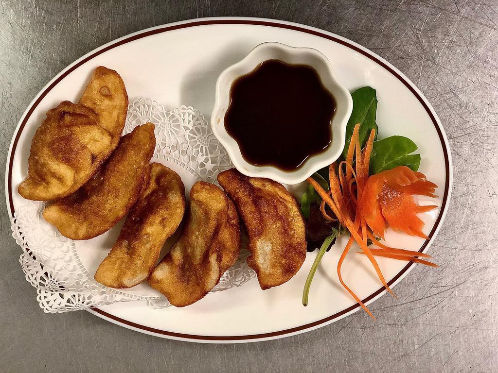 Thai Dumplings · Steamed or fried pork and vegetable Thai style ravioli - 5 pcs