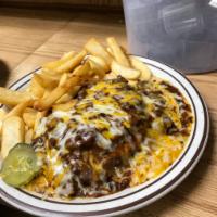 Chili Burger · Served open face and topped with chili beans and cheddar cheese.