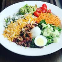 Cobb Salad · Mixed greens, hard-boiled egg, carrot, avocado, cucumber, tomato, bacon, blue cheese, chedda...
