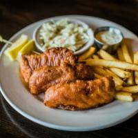 Fish and Chips · Beer battered Canadian walleye, coleslaw and fries.