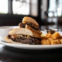 Stout's Dip Sandwich · Roast beef, melted Swiss, toasted French roll, au jus, hot giardiniera peppers available upo...