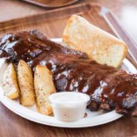 #1 - BBQ Baby Back Ribs Family Meal · 2 full slabs BBQ baby back ribs, 1 lb. Greek-style potatoes or French fries, 1 lb. coleslaw,...