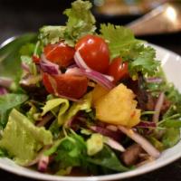 Pineapple Beef Salad** ( G ) · Sliced Grilled Steak | Pineapple | Tomato | Cilantro | 
Red Onion | Scallion | Lettuce | Spi...