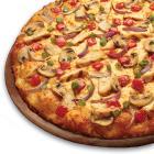 Chicken and Garlic Gourmet Pizza · Chicken, garlic, mushrooms, tomatoes,  red and green onions, Italian herb seasoning on cream...