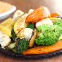Grilled Vegetable Fajitas · Fresh zucchini, mushrooms, carrots, and squash grilled and tomato wedges, broccoli and cauli...
