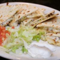 Vegetable Quesadillas  · An array of fresh grilled vegetables, layered with melted chihuahua cheese, and fresh pico d...
