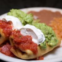Chimichanga Dinner · Char-broiled Chicken Breast or Beef and Monterey Jack cheese stuffed inside crisp golden tor...