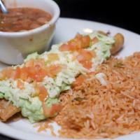 Flautas Dinner · Tightly rolled corn tortillas filled with seasoned chicken in a mild red sauce. Fried crisp ...