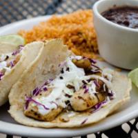 Fish Taco Dinner · Seasoned fork-tender pieces of tilapia filet (whitefish) grilled to perfection and served in...