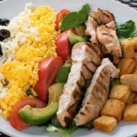 Southwestern Cobb Salad · Char-broiled chicken, American and Monterey Jack cheese, tomatoes, black olives, croutons, a...