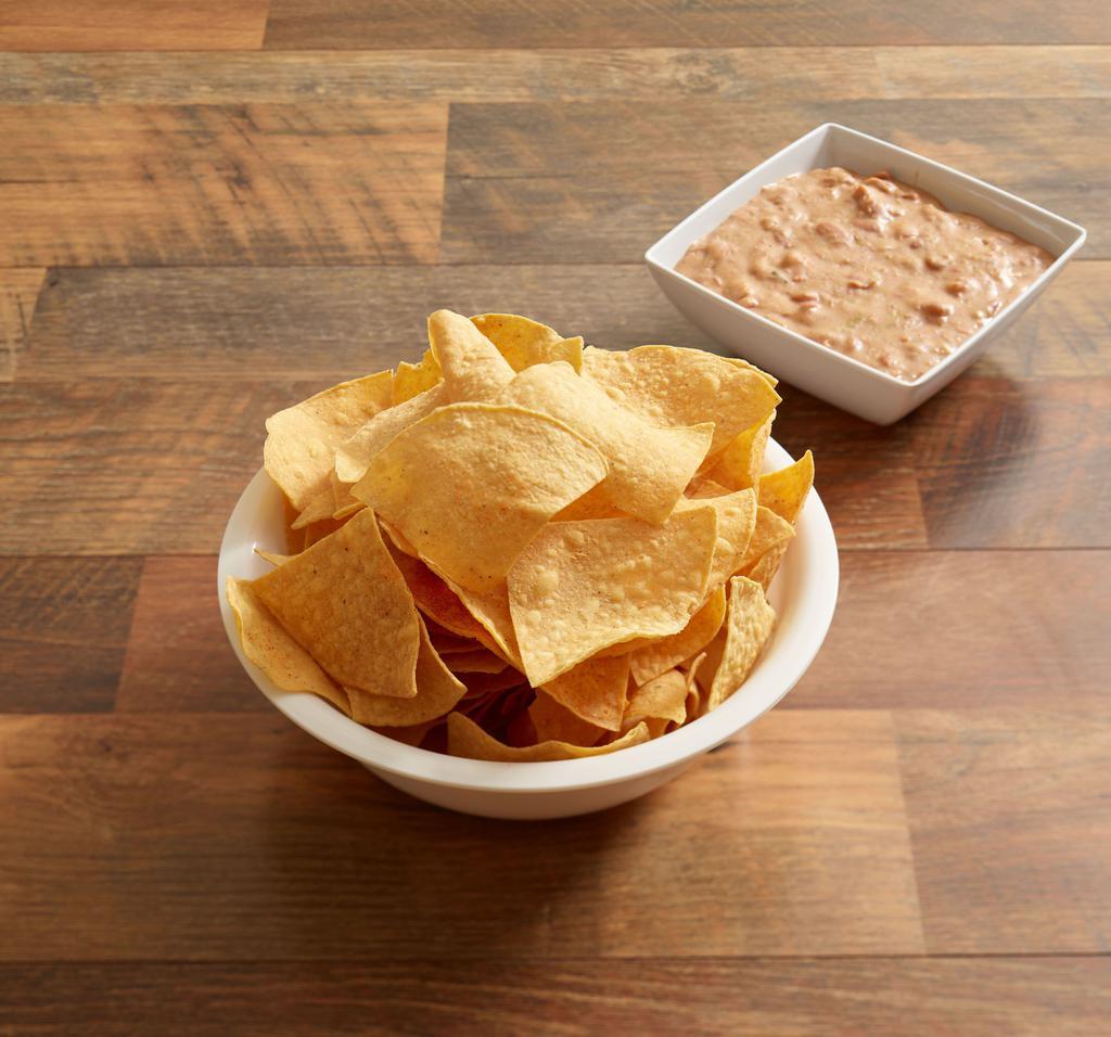 Spicy Bean Dip · A great blend of refried beans, chile verde sauce
and cheese served with hot chips for dipping.