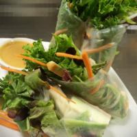 Summer Rolls · 4 pieces. Mixed baby green, baked tofu, carrots, bean sprouts, cucumbers, wrapped in clear r...