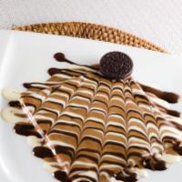 Y.O.L.O Crepe · Crepe stuffed with Oreo and melt n dip special cream with Belgian milk, dark and white choco...