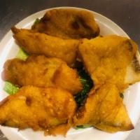 2. Fried Fish · Cooked in oil.