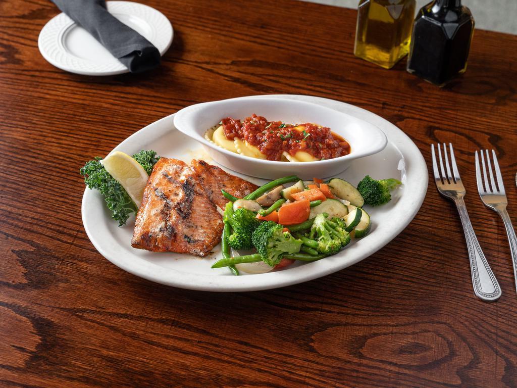 Grilled Alaskan Salmon · 8 oz. filet of salmon grilled in lemon and butter, garnished with parsley. Served with sauteed vegetables.