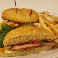 Italian Chicken Sandwich · Broiled breast of chicken topped with provolone. Served on french bread with roasted red pep...