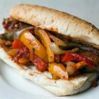 Italian Sausage Roll · Our Italian sausages sauteed with roasted red peppers in marinara and topped with provolone ...