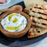 Tzatziki · Greek Yogurt with Labne, Cucumbers, Garlic and Fresh Dill. Served with Pita Bread