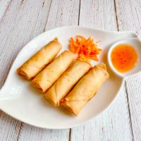 Crispy Rolls  · Deep fried miniature egg rolls stuffed with chicken and veggies served with sweet and sour s...
