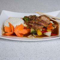 Crispy Tamarind Duck  · Crispy boneless duck with tamarind sauce with veggies & white rice.