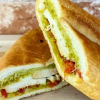 Chicken Pesto · Chicken breast, sun dried tomatoes, basil pesto aioli and provolone cheese served on a frenc...