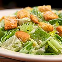 Caesar Side Salad · Romaine hearts, Caesar dressing, croutons, Parmesan.
