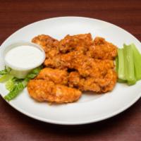 Boneless Wings · All white meat chicken with your choice of sauce. Served with celery sticks and ranch or blu...