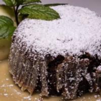Chocolate Lava Cake · Slrawberrv compote, whipped cream and chocolate pearls.