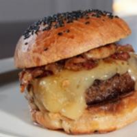 CC Burger · 8 oz. chuck blend, cheddar cheese, bacon jam, bistro fries, English muffin.