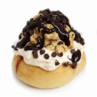 Cookie (Dough) Monster Roll · cake batter frosting, topped with cookie dough and chocolate sauce