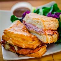 Ham & Swiss Croissant · Black Forest Ham, Swiss Cheese, and a house Honey Mustard Reduction toasted on a signature s...