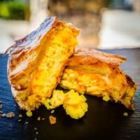 Egg & Cheese Croissant · Fluffy scrambled eggs and your choice of cheese all on Squarz’s signature flaky croissant bu...