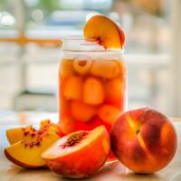 Peach Iced Tea · Cool down with this crisp, refreshing black tea layered with all-natural peach essence.