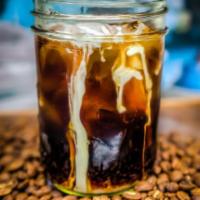Cold Brew · 24 ounce Cartel cold brew with choice of milk and flavor.