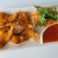 Golden Butterfly Shrimp · 6 butterfly shrimp fried to golden brown served with katsu sauce.