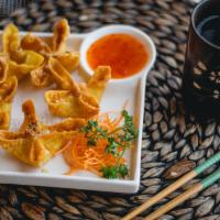 Crispy Cheese Rangoon · Hand-folded wontons filled with crab and cream cheese. Served with sweet chili sauce.